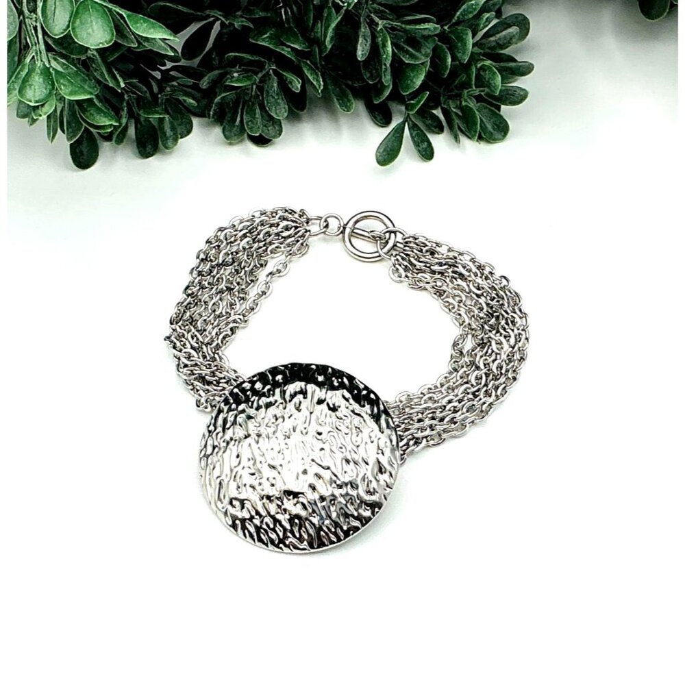 Silver Tone Multi-Strand Chain Bracelet With Hammered Circular Disc Pendant